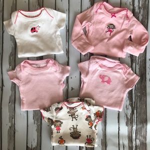 Bundle of 5 newborn girl’s onesies.